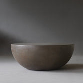 Front view of the Moon Coffee Table in 900 Diameter in Pebble finish